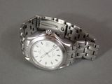 a close up of a watch on a table