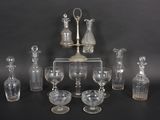 a lot of glass items that are sitting on a table