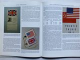 an open book with pictures of flags on it