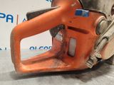 a close up of a chainsaw on a table