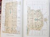 an open book with a map of a city on it