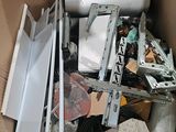 a cardboard box full of assorted items in it