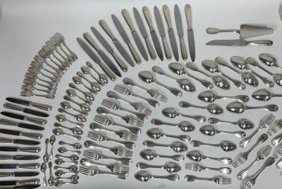 a lot of silverware on a table with spoons and forks