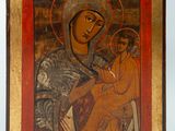 une image d'un tableau représentant une femme tenant un enfant sur ses genoux
