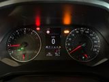 a close up of a car dashboard with various gauges