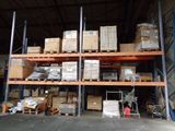 many boxes on the shelves in the warehouse