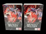 two boxes of one piece card game with a picture of two people
