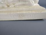 marble sculpture of a woman on a horse on a marble base
