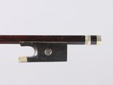 a close up of a violin bow on a white background