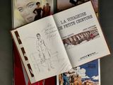 an open book with a drawing of a woman on it