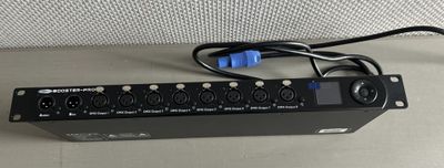 a black power strip with a blue and black plugged in it