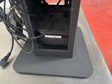 a black computer case sitting on top of a table