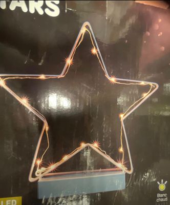 a picture of a lighted star in the shape of a star