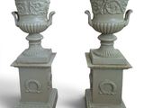 two vases that are sitting on top of each other