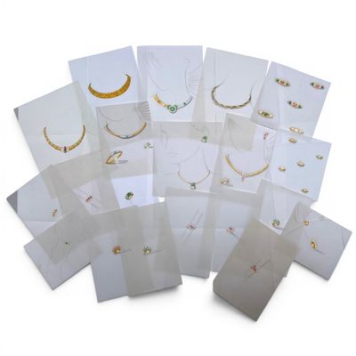 many cards with different designs on them on a white surface