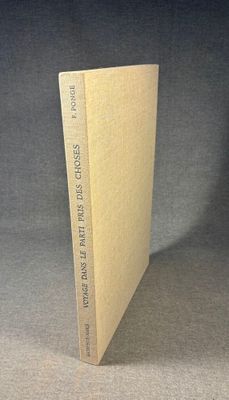 the front cover of a book with a bookmark on it