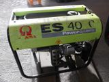an electric generator that is sitting on the ground