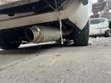a picture of a car parked on the side of the road