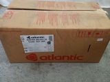 a box with a red and white logo on it sitting on the floor