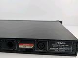 a close up of a black electronic device sitting on a table