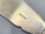 a close up of a knife on a table