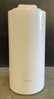 an image of a white air purifier sitting on top of a counter