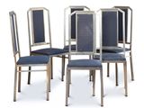 four chairs with blue upholstered seats and a metal frame