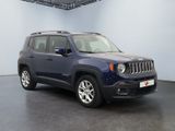 the blue jeep renegade is parked in a room with a black floor
