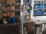 an image of a room with a bunch of boxes and a hose