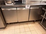 a kitchen with stainless steel appliances and a microwave