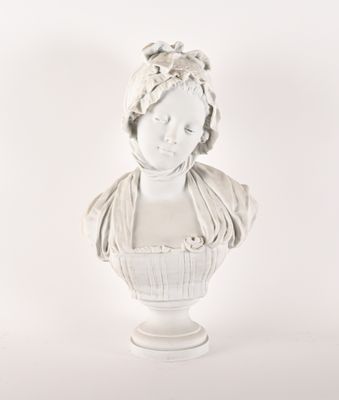 a white busturine of a woman on a pedestal
