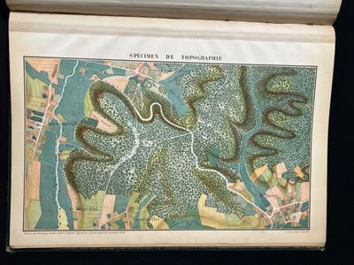 an old map of a city with a river in the middle of it