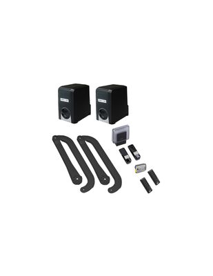 two black speakers are sitting on a white surface