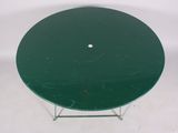 an image of a green table with a white dot on the top