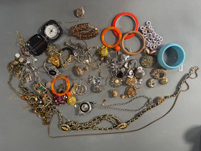 many different types of jewelry on the table