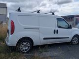 a white van parked on the side of the road