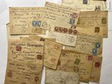 many old letters and stamps on the table