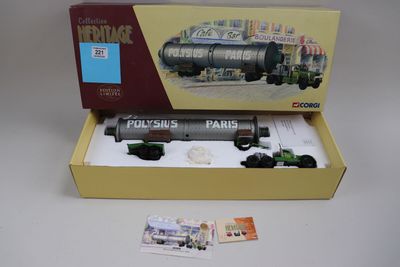 une boîte sur laquelle est représenté un petit train qui se trouve à l'intérieur de la boîte