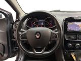 the interior of a car with a steering wheel, dashboard, and dash board