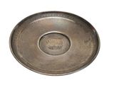 a silver plate on a white surface with a white background