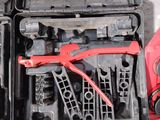 two tools in the case on the ground