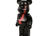 a black bear with blood on it ' s face