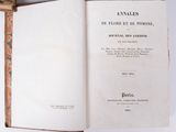 an open book with a picture of a bird on it