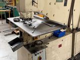 an image of a machine in a factory with a lot of tools