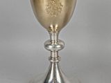 silver plated goblet with crest of the knights of england on it