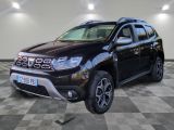the front view of a black dacia parked on a checkered floor
