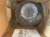 a box with a glass bowl inside of it