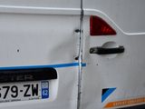 a white van with a blue stripe on the side of it