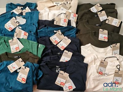 a box full of men ' s clothing with price tags on them