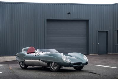 an image of a car parked in front of a garage